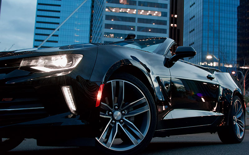 Black premium sedan in the city